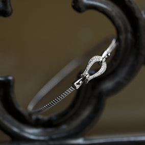 Rhodium Plated CZ Horseshoe Hook Bangle