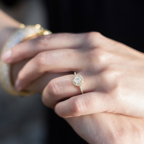 10 Karat Gold Halo Style Ring with White Topaz and Sapphires