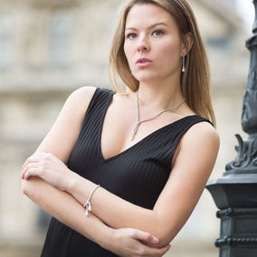 Rhodium Plated Coreana and Cultured Freshwater Pearl End Bolo Necklace