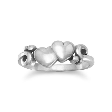 Ring with Two Hearts and Swirl Design
