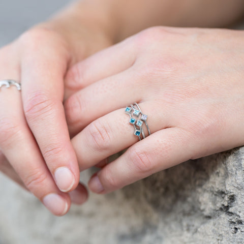 Rhodium Plated Swiss Blue Topaz Open Design Ring