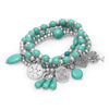 Set of 4 Silver Tone Multicharm Fashion Stretch Bracelets with Reconstituted Turquoise