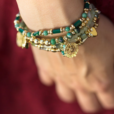 Set of 5 Gold Tone Fashion Stretch Bracelets with Green Stones